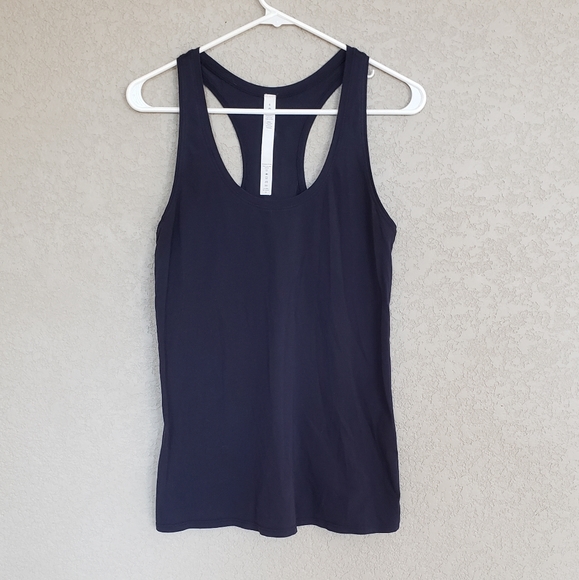 lululemon athletica Tops - Lululemon tan top size 6 color blue